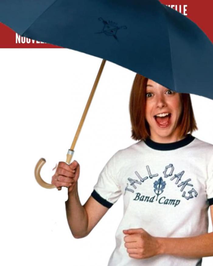 Michelle qui tient un parapluie