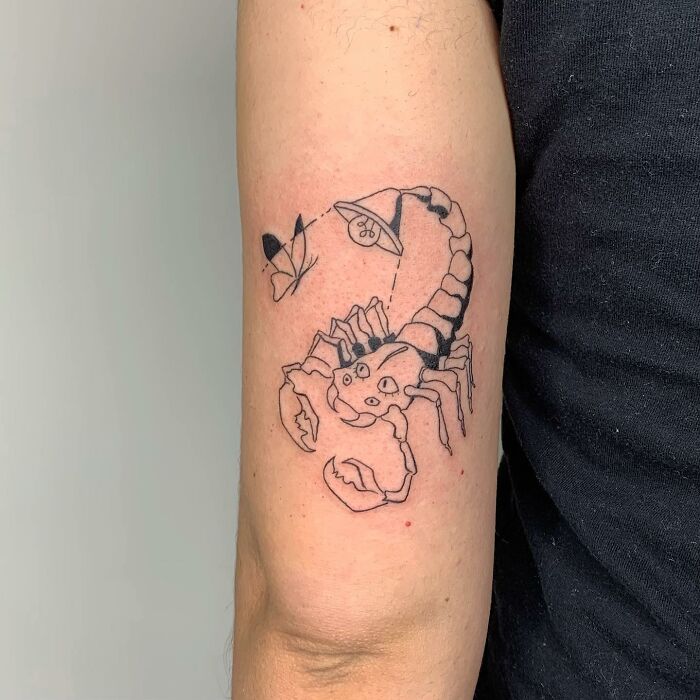 Tattoo de Reena Wu Un scorpion avec une lampe en bout de queue