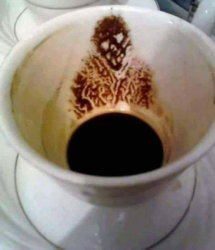 visage tasse de café