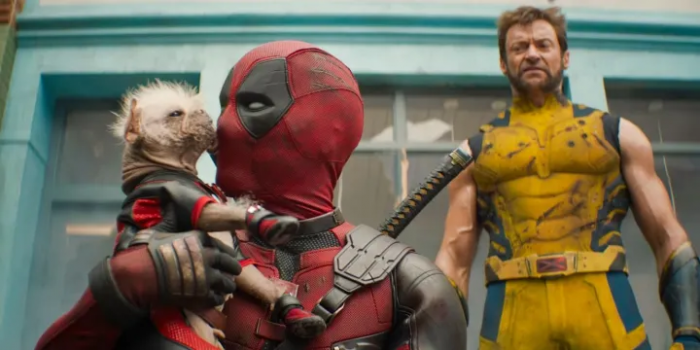 Deadpool et Dogpool avec Wolverine en arrière-plan