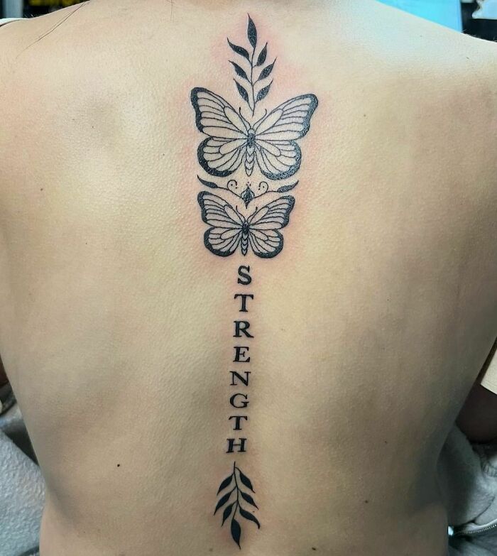 tatouage papillon double