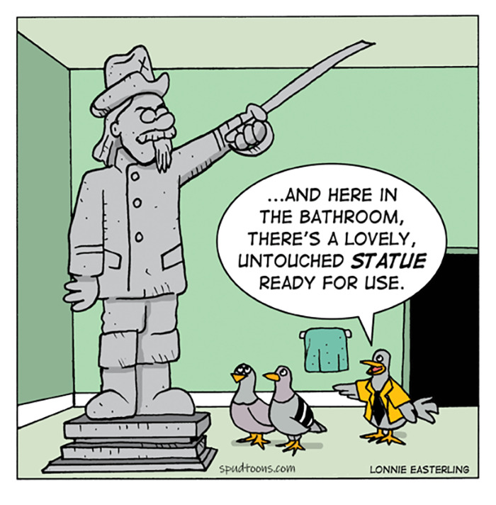 une statue et des pigeons